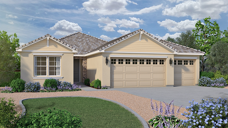 Single-story house with beige walls and a gray tiled roof, featuring two garage doors. The front yard has a curved driveway, green lawn, shrubs, and flowering plants. The sky is partly cloudy with greenery surrounding the property.